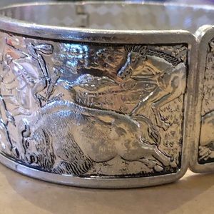 Silver toned SnapBack craved bracelet